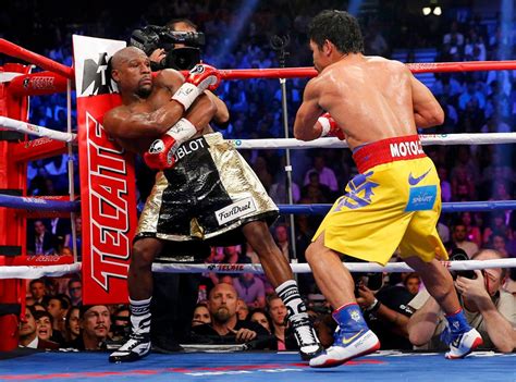 Mayweather defeats Pacquiao in 12.